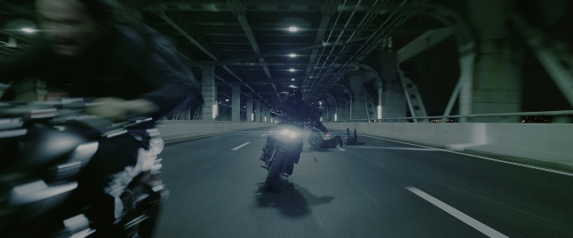 Wide shot frame from John Wick: Chapter 3 - Parabellum — night, person, land vehicle