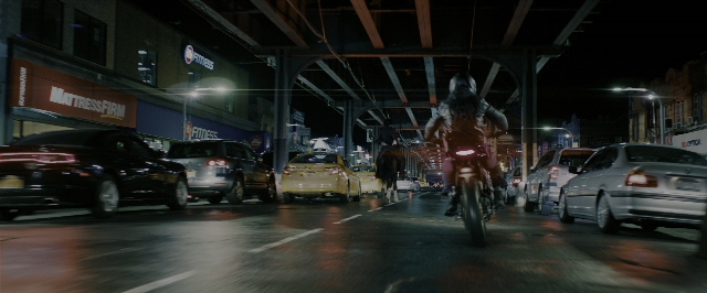 Wide shot frame from John Wick: Chapter 3 - Parabellum — street, hat, car