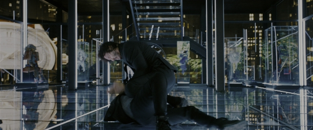 Wide shot frame from John Wick: Chapter 3 - Parabellum — room, suit, night