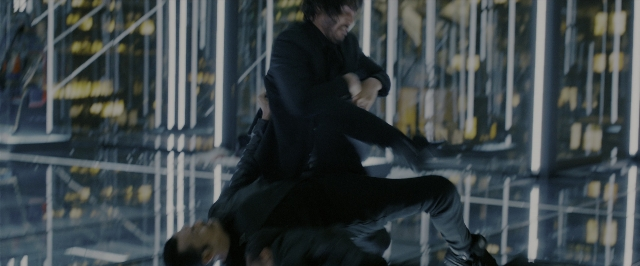 Wide shot frame from John Wick: Chapter 3 - Parabellum — suit, person, human face