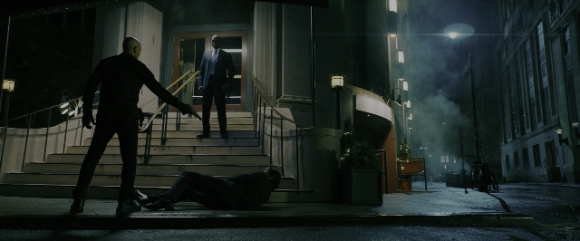 Wide shot frame from John Wick: Chapter 3 - Parabellum — standing, street, suit