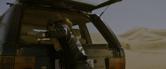 Wide shot frame from John Wick: Chapter 3 - Parabellum — standing, plate, hand