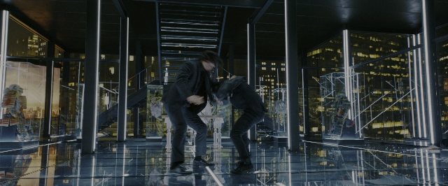 Wide shot frame from John Wick: Chapter 3 - Parabellum — room, mirror, hand