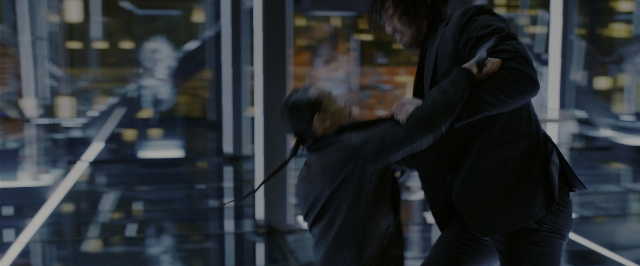 Wide shot frame from John Wick: Chapter 3 - Parabellum — standing, fight, person