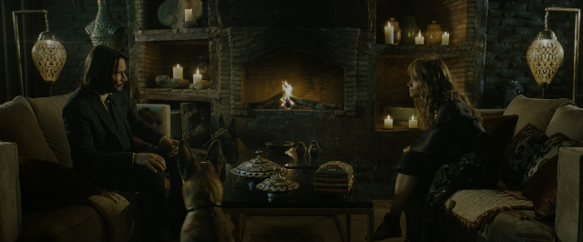 Wide shot frame from John Wick: Chapter 3 - Parabellum — sitting, room, table