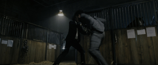 Wide shot frame from John Wick: Chapter 3 - Parabellum — fight, person