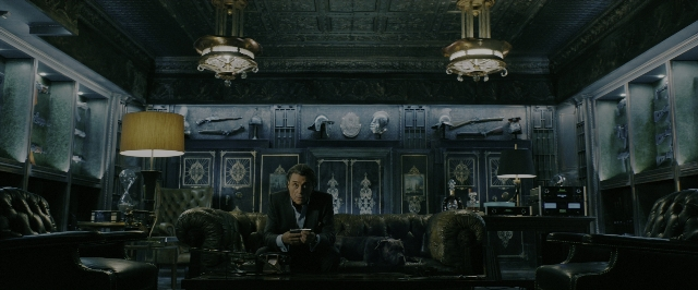 Wide shot frame from John Wick: Chapter 3 - Parabellum — sitting, room, table