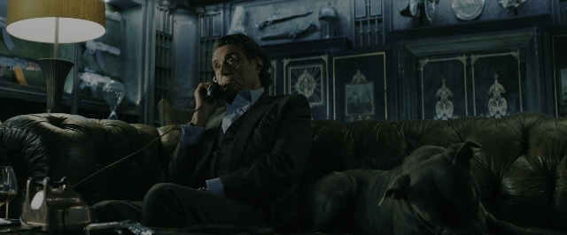 Wide shot frame from John Wick: Chapter 3 - Parabellum — sitting, room, table