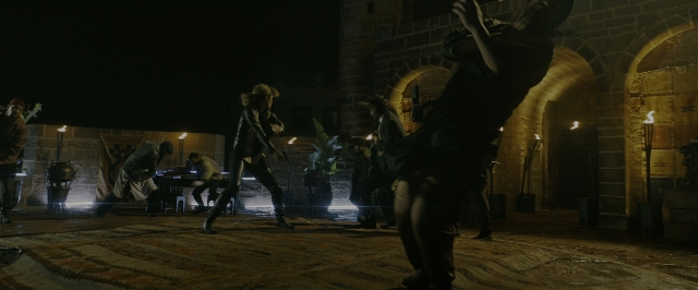 Wide shot frame from John Wick: Chapter 3 - Parabellum — standing, room, hat