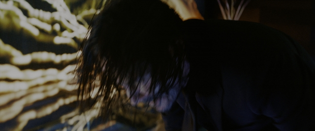 Wide shot frame from John Wick: Chapter 3 - Parabellum — standing, room, face