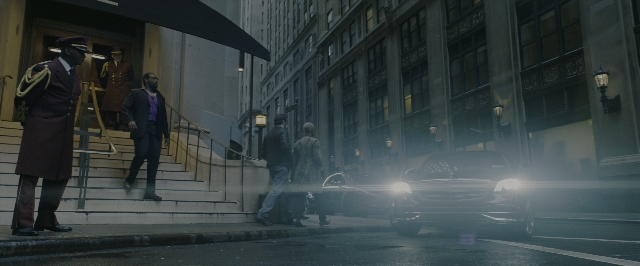 Wide shot frame from John Wick: Chapter 3 - Parabellum — standing, walking, street
