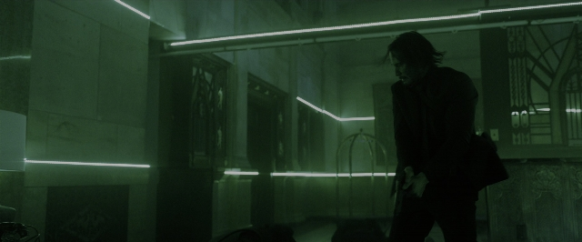 Wide shot frame from John Wick: Chapter 3 - Parabellum — standing, room, face