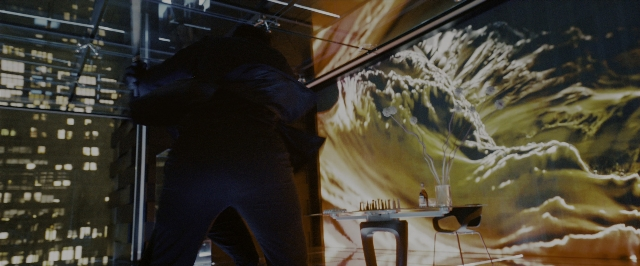 Wide shot frame from John Wick: Chapter 3 - Parabellum — standing, table, night