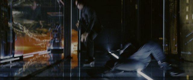 Wide shot frame from John Wick: Chapter 3 - Parabellum — room, door, street
