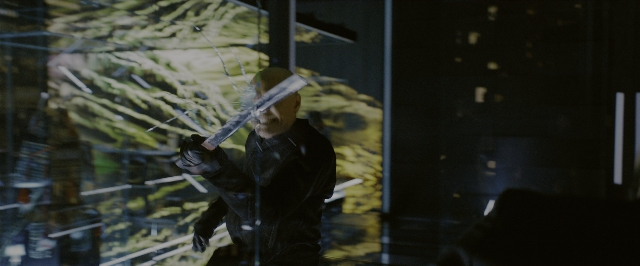 Wide shot frame from John Wick: Chapter 3 - Parabellum — standing, room, street