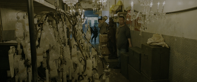 Wide shot frame from John Wick: Chapter 3 - Parabellum — walking, room, person