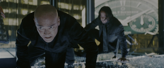 Medium shot frame from John Wick: Chapter 3 - Parabellum — standing, room, glass