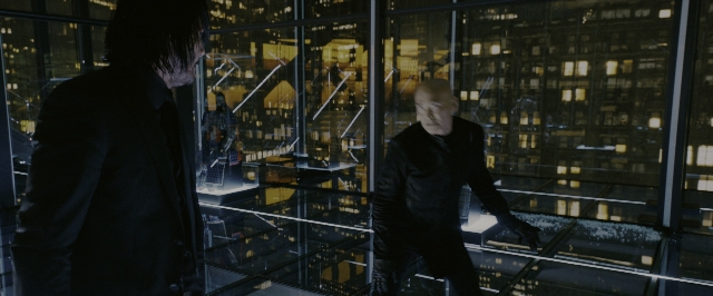 Wide shot frame from John Wick: Chapter 3 - Parabellum — standing, coat, night
