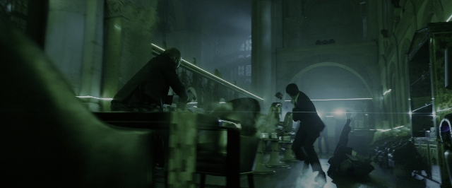 Wide shot frame from John Wick: Chapter 3 - Parabellum — standing, room, table