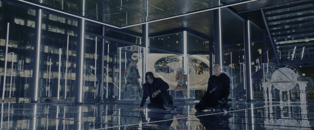 Wide shot frame from John Wick: Chapter 3 - Parabellum — sitting, mirror, glass