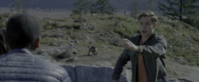 Wide shot frame from Power Rangers — standing, dialogue, dog