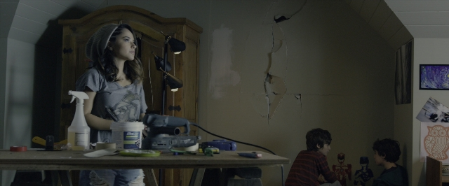Frame from Power Rangers — sitting, standing, room