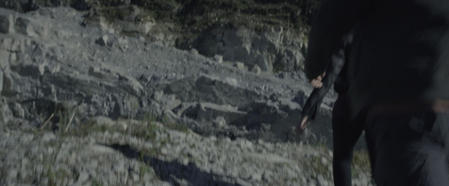Wide shot frame from Power Rangers — walking, hand, person