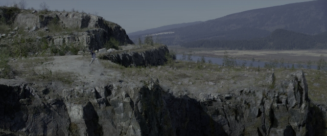 Wide shot frame from Power Rangers — walking, water, person