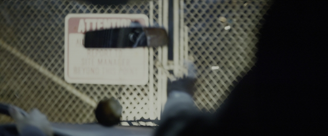 Frame from Power Rangers — car, hand, person