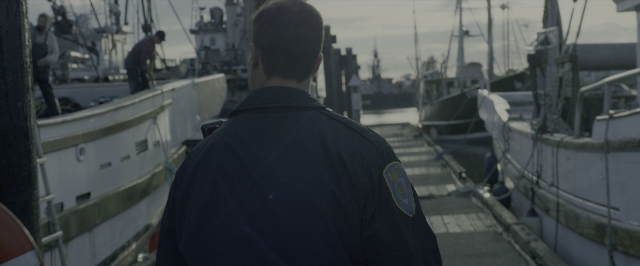 Medium shot frame from Power Rangers — standing, water, boat