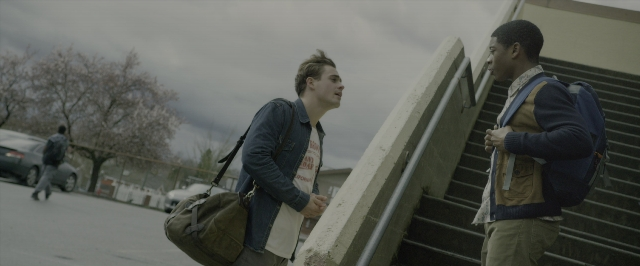 Wide shot frame from Power Rangers — walking, dialogue, jacket