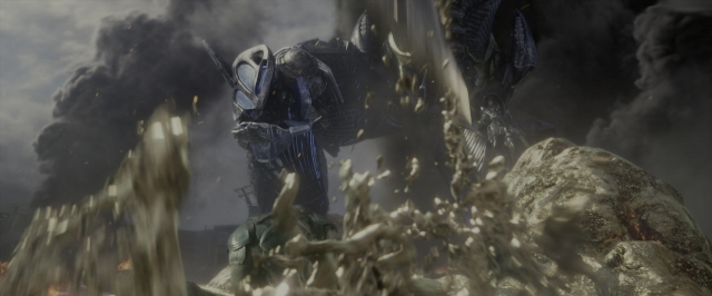 Wide shot frame from Power Rangers — hat, suit, smoke