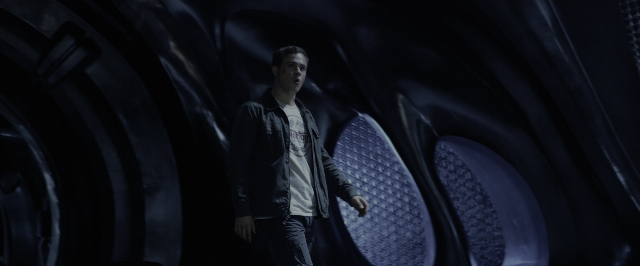 Medium shot frame from Power Rangers — standing, shirt, face