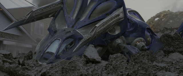 Wide shot frame from Power Rangers — boat, wheel, land vehicle