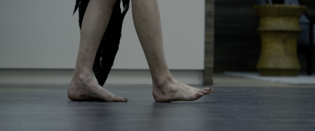 Medium shot frame from Power Rangers — standing, person, human foot