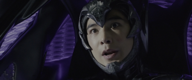 Close-up frame from Power Rangers — hat, face, person