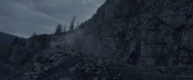 Wide shot frame from Power Rangers — standing, smoke, person