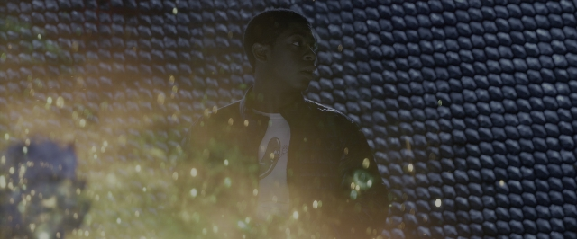 Wide shot frame from Power Rangers — standing, shirt, person