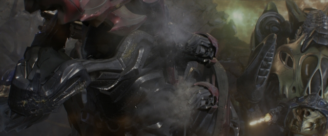 Wide shot frame from Power Rangers — hand, gun, face