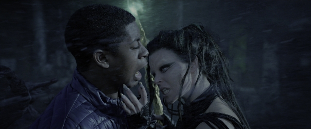 Wide shot frame from Power Rangers — kiss, hand, hair