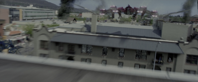 Frame from Power Rangers — window, building