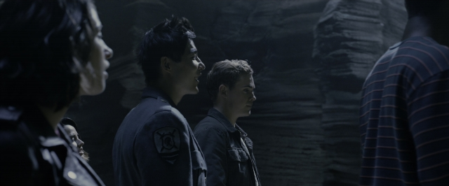 Wide shot frame from Power Rangers — standing, dialogue, face