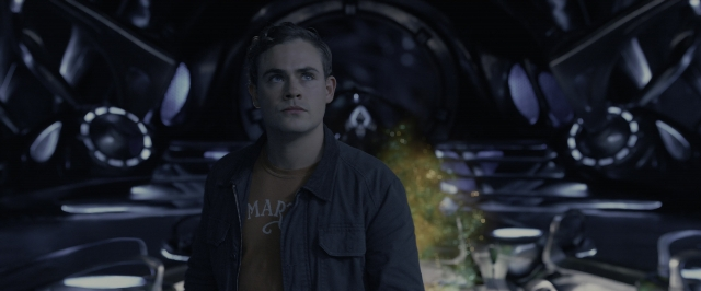 Wide shot frame from Power Rangers — standing, room, shirt