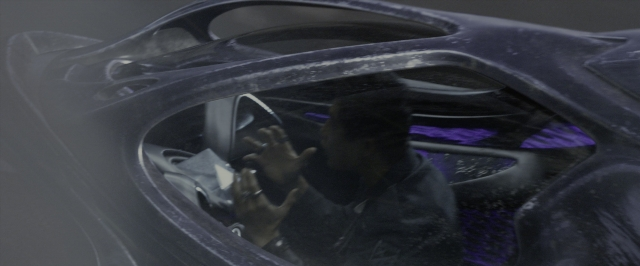 Wide shot frame from Power Rangers — car, window