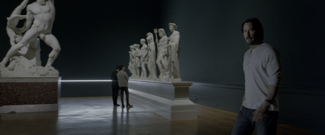 Wide shot frame from John Wick: Chapter Two — standing, shirt, face
