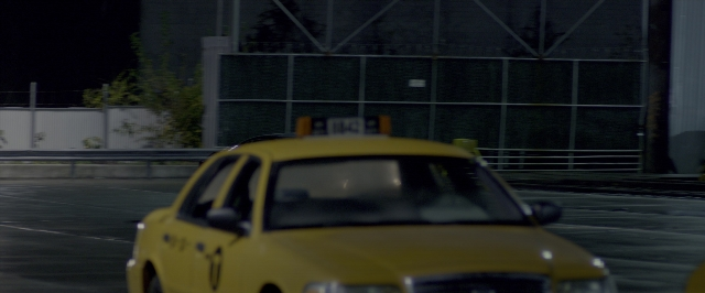 Wide shot frame from John Wick: Chapter Two — plate, car, night