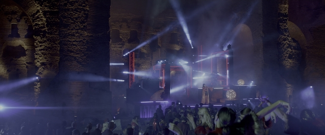 Wide shot frame from John Wick: Chapter Two — standing, person, building