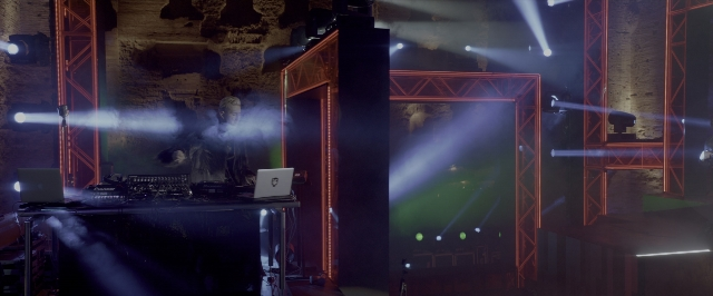 Wide shot frame from John Wick: Chapter Two — standing, furniture