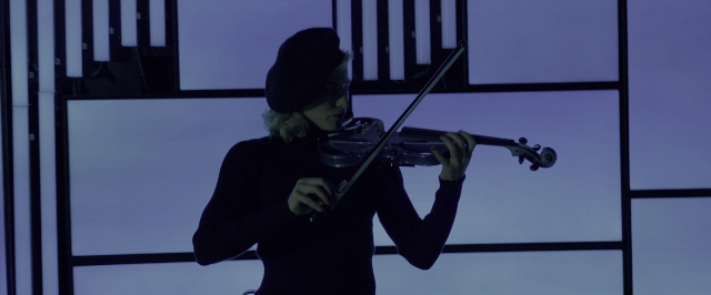 Wide shot frame from John Wick: Chapter Two — hand, night, hair