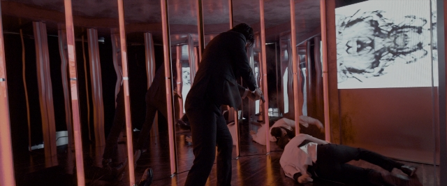 Wide shot frame from John Wick: Chapter Two — standing, room, person